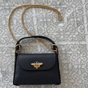Italian Hand Made from the same makers of Gucci
Chic Navy Blue Mini Bag